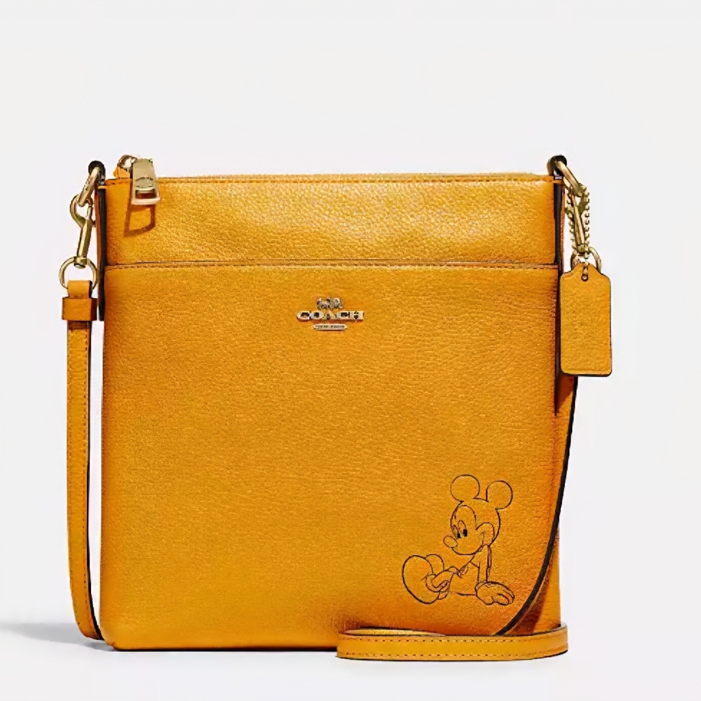 Coach Orange Crossbody Bag with Disney Design.